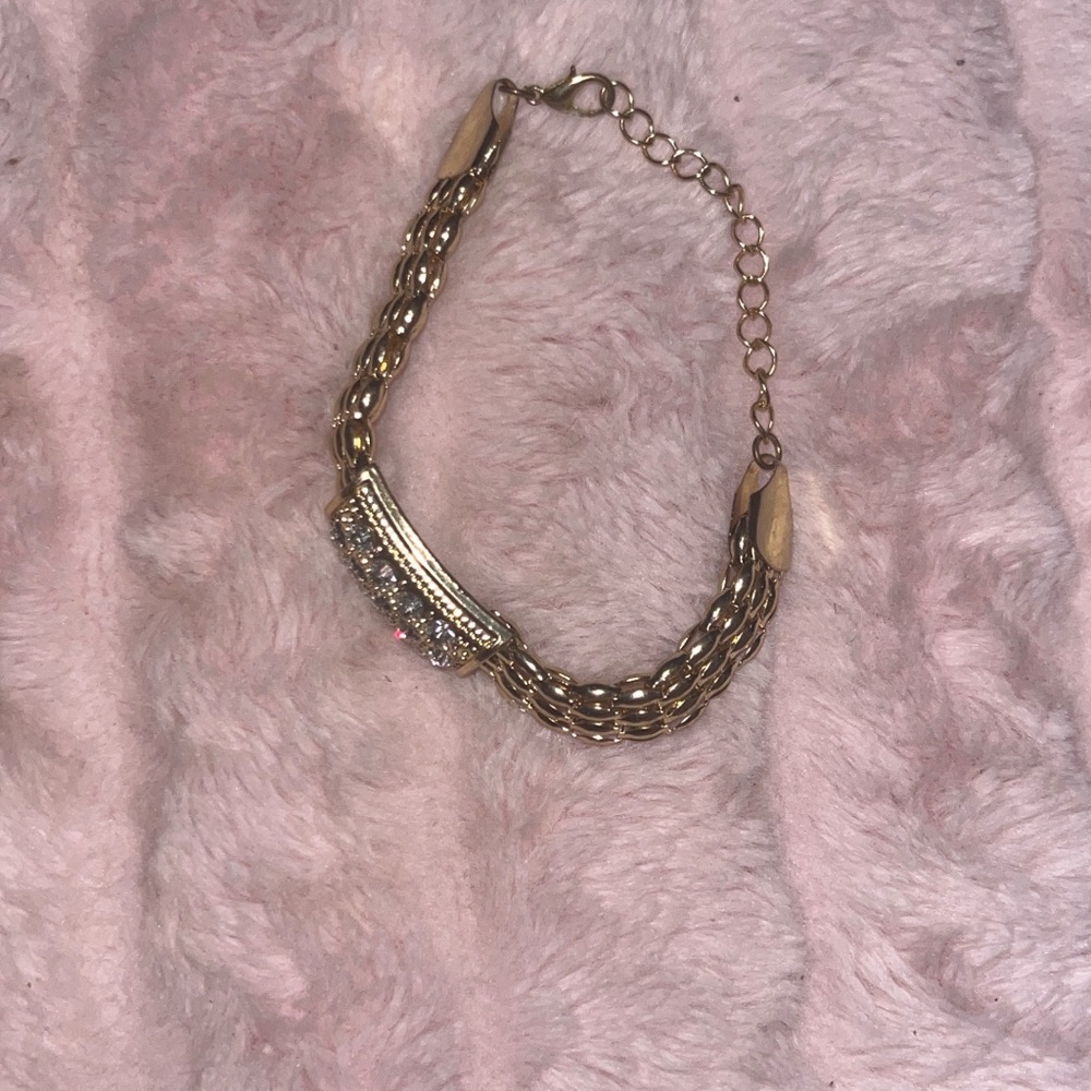 Elegant Gold Bracelet with Silver Accents